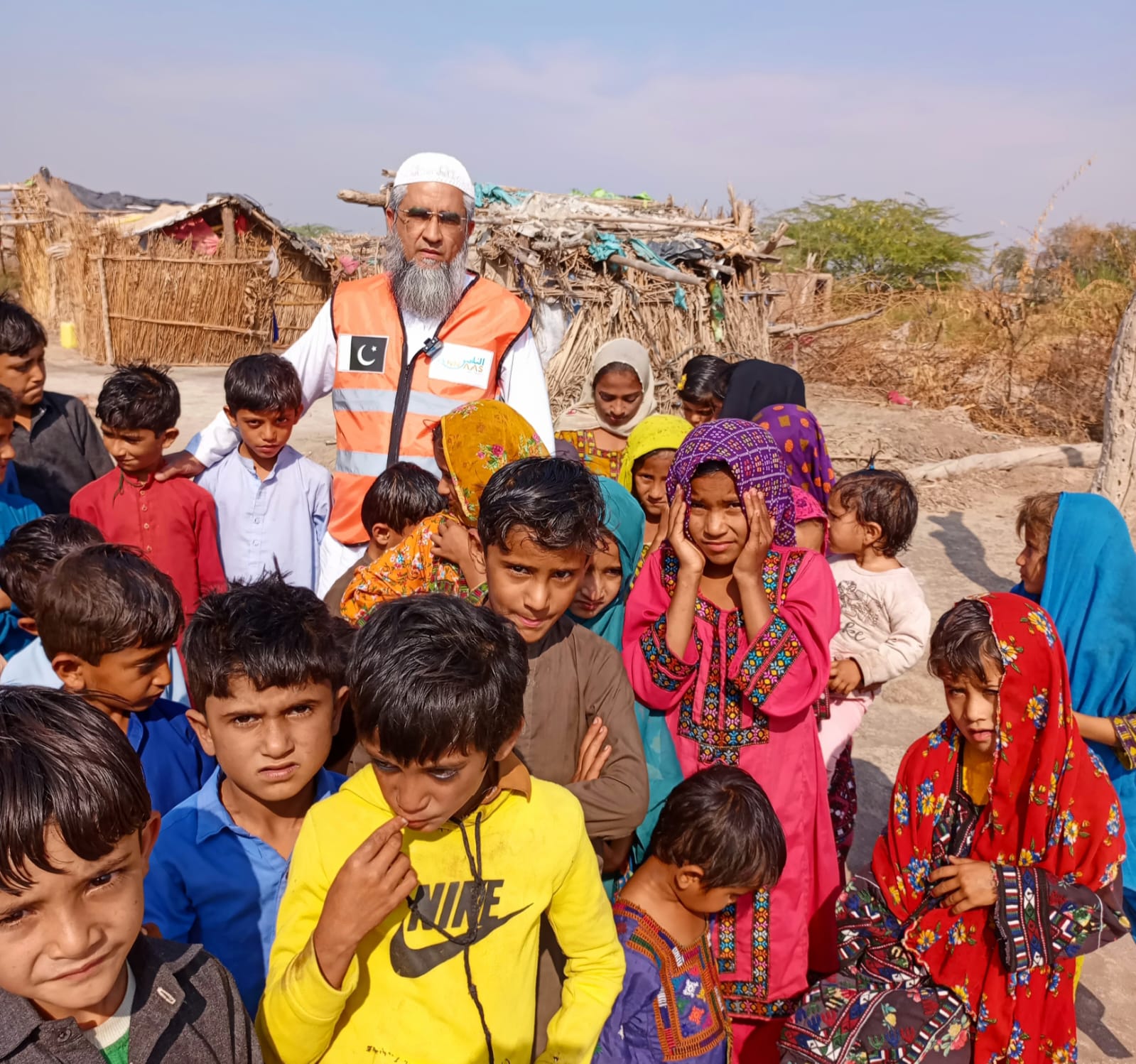 Chairman Hameed Hussain with children in rural village Sindh