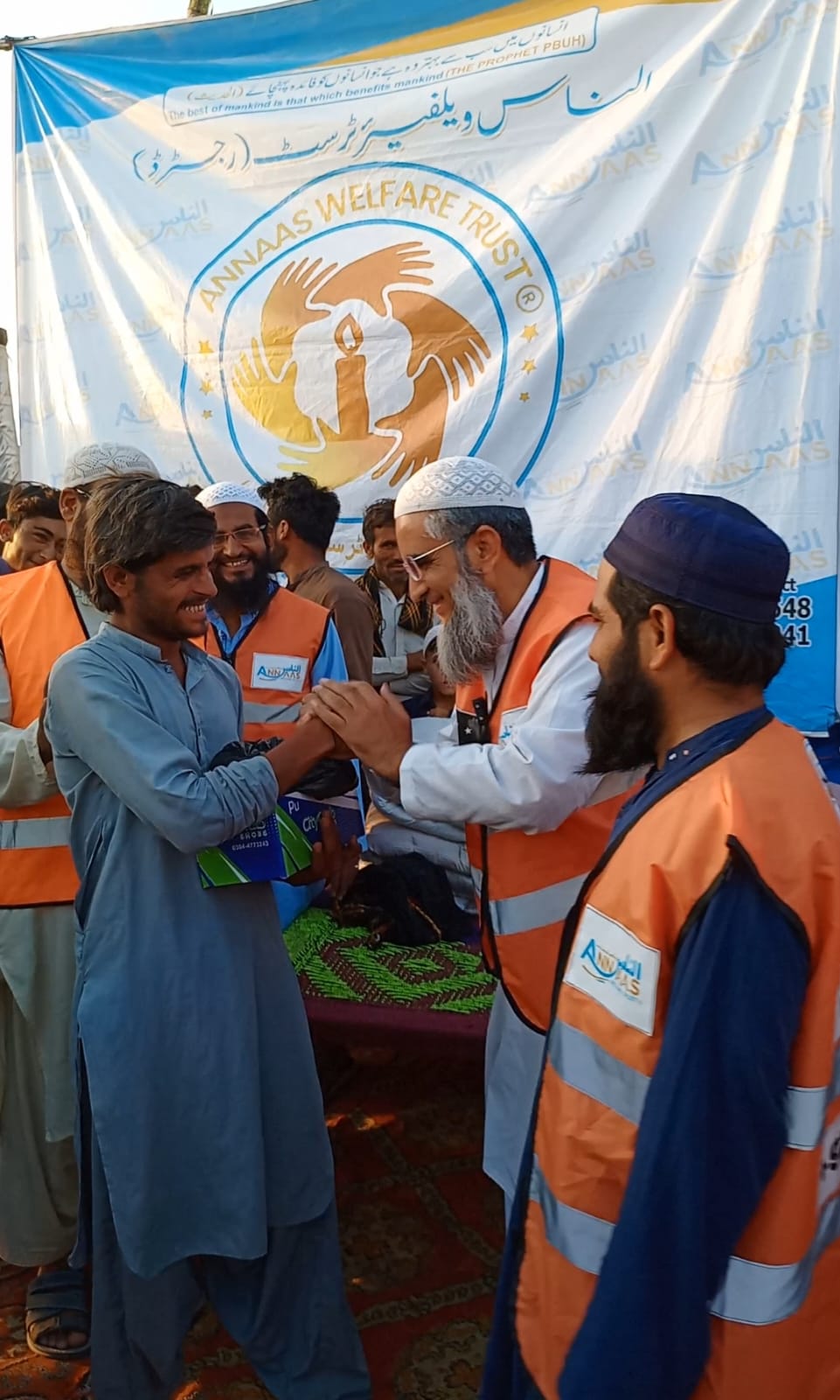 Chairman Hameed Hussain meeting community members